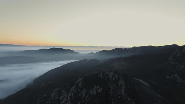 Mountain landscape with forest covered by a veil of fog in Malibu Canyon, Calabasas, California, USA