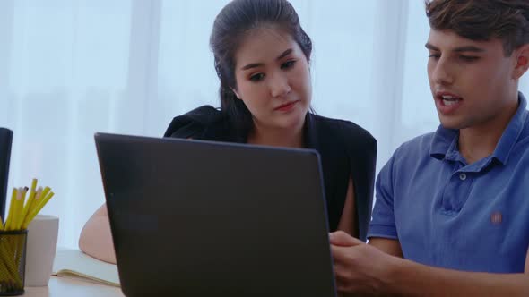 Creative Business People Group Having Conversation at Office Desk in Workplace