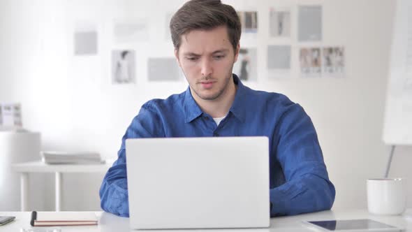 Casual Adult Man Upset By Loss at Work