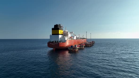 A gas tanker is anchored at sea aerial view 4 K