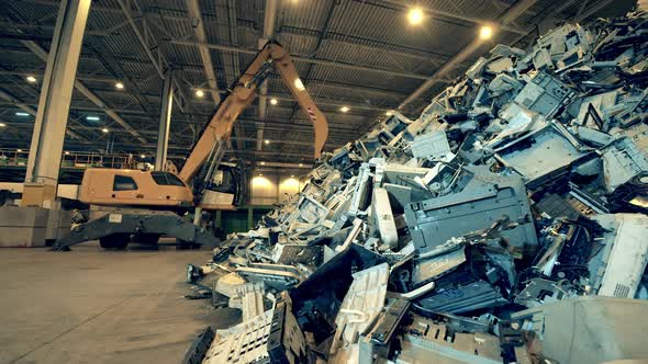 Debris of Office Machines in the Indoors Dumpsite