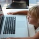 Small Girl Playing On Laptop Computer - VideoHive Item for Sale