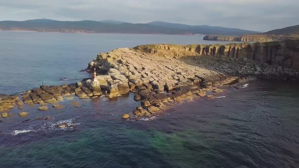 Drone View of a Beautiful Peninsula Tobizina with Vertical Cliffs at Sunset