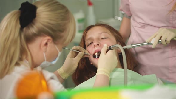 A Dentist Who Did a Tooth Brushing in a Teenager in a Dental Clinic