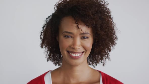 Portrait of mixed race woman looking at camera and smiling