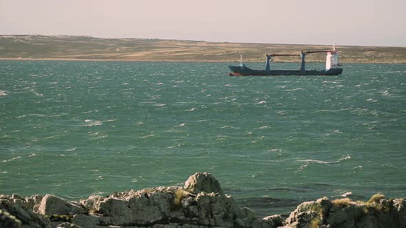 Empty Container Cargo Ship anchored Off the Harbor.