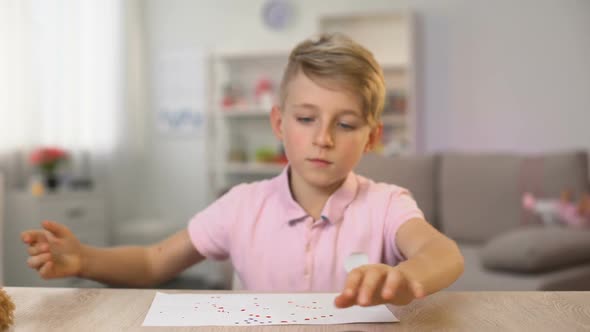 Male Kid Watching Television Instead Drawing, Changing Channels Remote Control