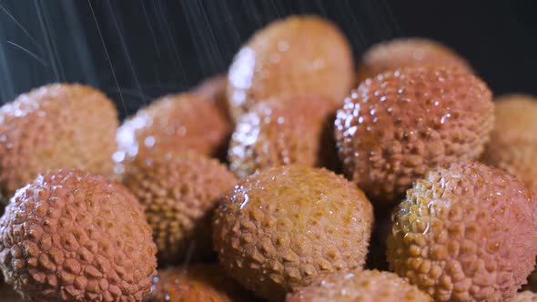 Fruits of Thai Frkuta Litchi on a Black Background