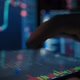 Trader Hand Analyzes the Stock Market on a Tablet - VideoHive Item for Sale