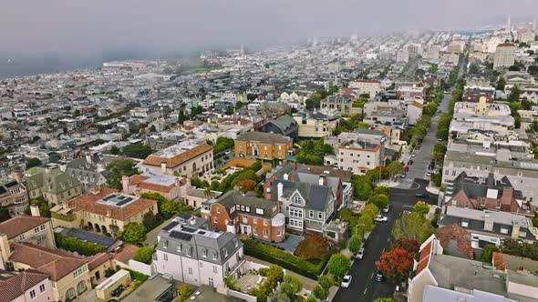 Cityscape with traffic, walking people and streets in San Francisco