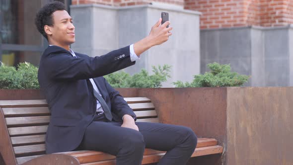 African Businessman Taking Selfie on Phone