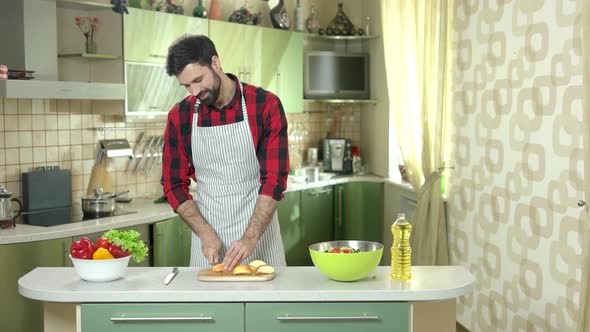 Man Cuts Apple