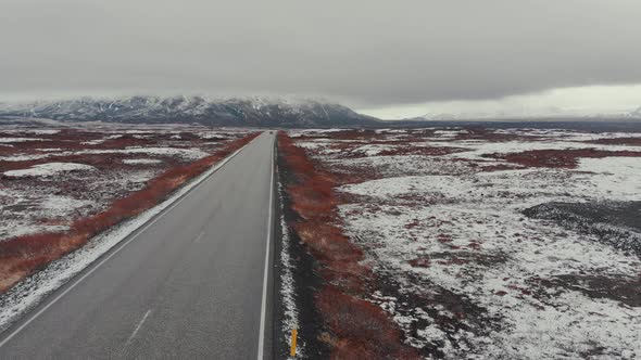 Straight road in cold valley