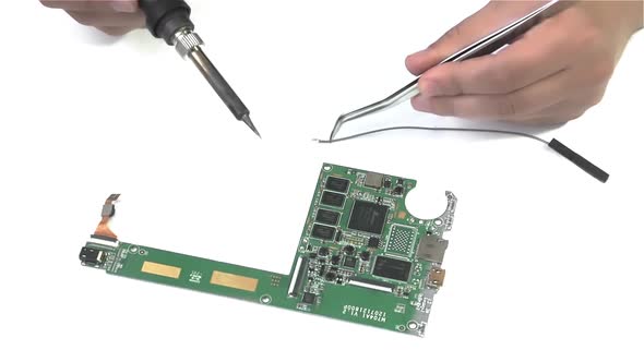 Soldering PCB on White Background