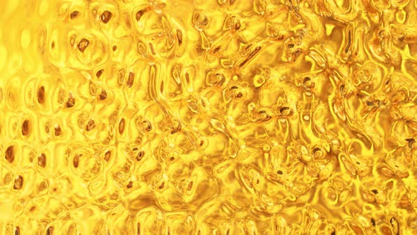 Super Slow Motion Shot of Golden Liquid Luxury Background at 1000Fps