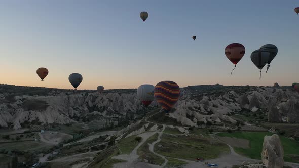 parade of balloons taking off at dawn in Cappadocia. travel concept