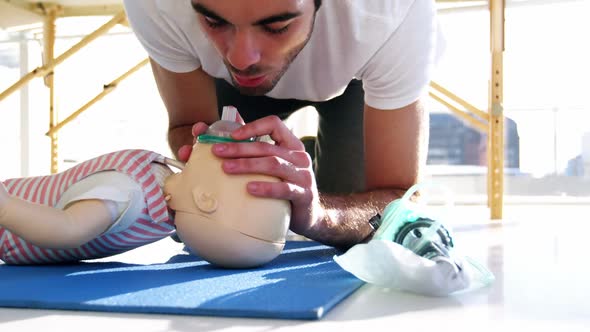 Paramedic during mouth-to-mouth resuscitation training