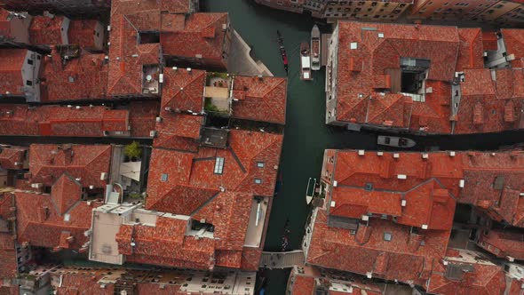 Beautiful Orange Roofs and Narrow Canals of Venice in Italy