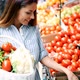 Picture of Woman at Marketplace Buying Vegetables - VideoHive Item for Sale