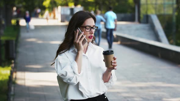 Woman Employee in Glasses White Shirt