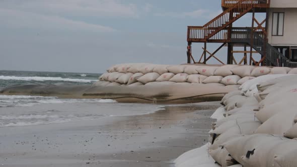 beach homes being overtaken by the ocean