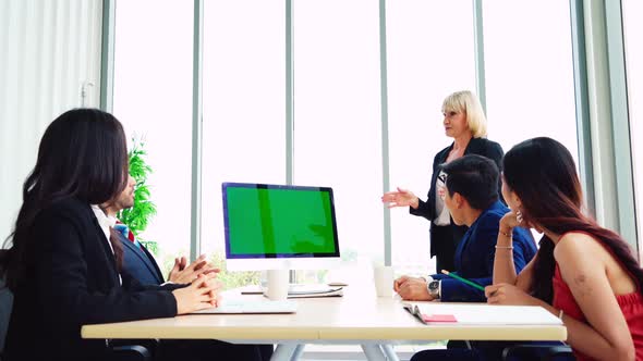 Business People in the Conference Room with Green Screen