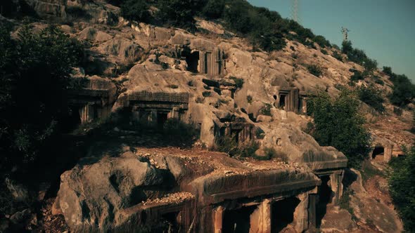 Close Up View of Mountain Hillside with Tombs Carved in Rocks