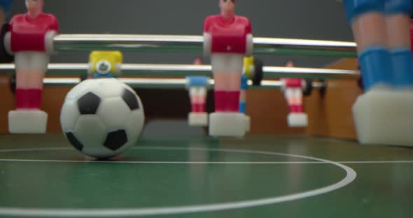 Professional Soccer Players Playing Pass Trying to Score a Goal