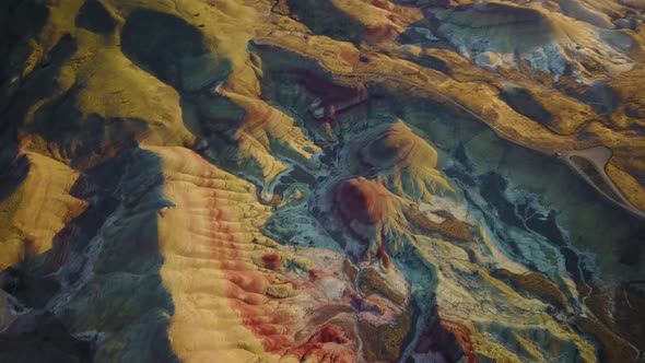 Aerial view of Painted Hills rock formation during the sunset, Oregon, U.S.A.
