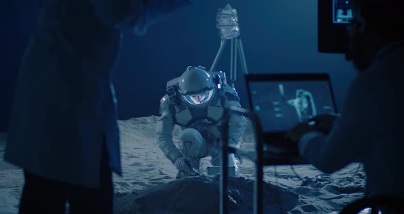 Astronaut and Scientists Testing Sample Collection alt