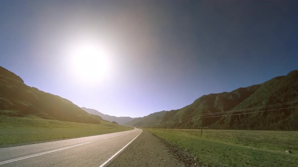 Mountain Road Timelapse at the Summer or Autumn Sunset Sunrise Time