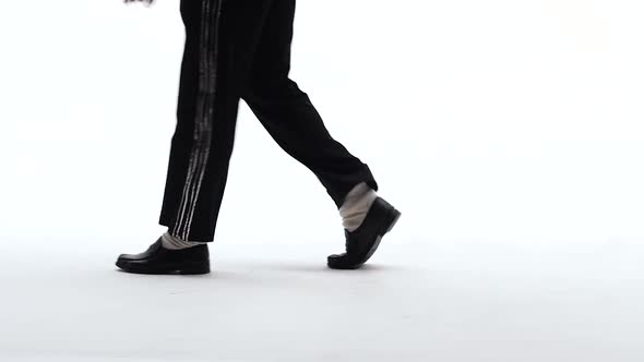 Young Stylish Teenager Is Showing Dance Moves Like Michael Jackson. Isolated Over White Background