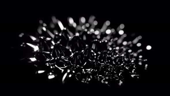 Super Slow Motion Macro Shot of Magnetic Liquid Ferrofluid in Motion at 1000Fps