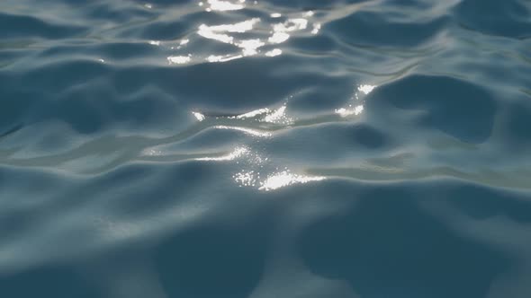 Bright Blue Sea Wave Surface in Motion