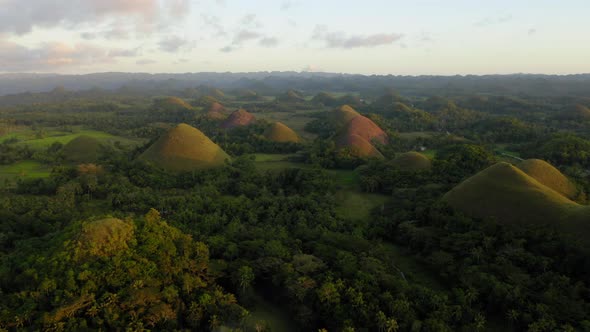 Aerial shot of Chocolate Hills at sunset in Bohol, Philippines