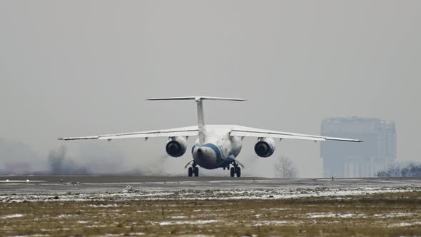 Slow Motion Video of a Plane Taking Off From the Runway in Winter