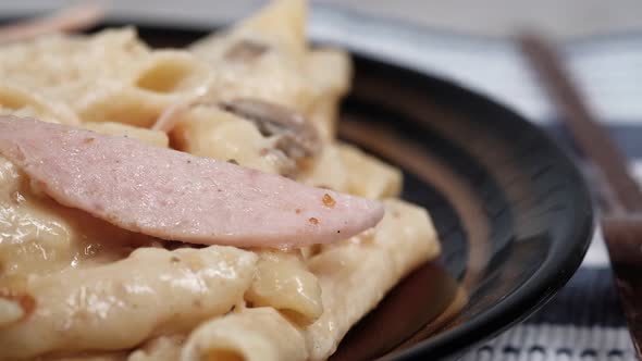  Homemade Cooked Pasta in a Plate on Table 