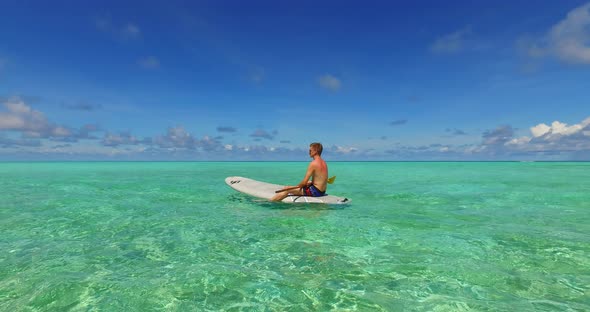 Romantic boy and girl after marriage in love live the dream on beach on clean white sand 4K background