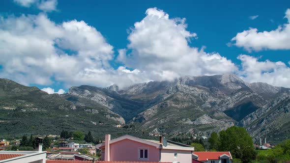 Clouds Over the Mountains on a Sunny Day Time Lapse