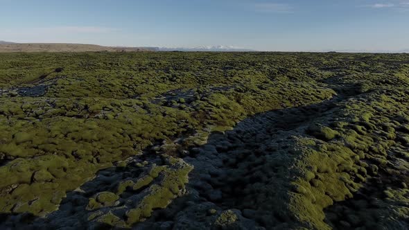 Flying Over Rocks And Moss In Iceland