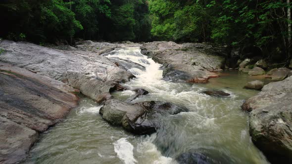 Drone flying close to brook upstream, Koh Samui, Thailand