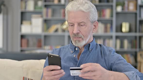 Online Payment Via Smartphone By Old Man