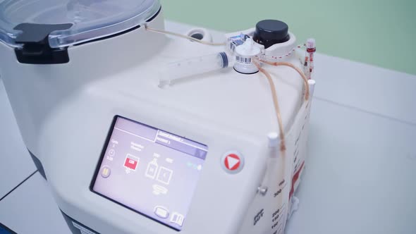 Contemporary apparatus for stem cells. Stem cells injection procedure. Modern equipment in clinic.