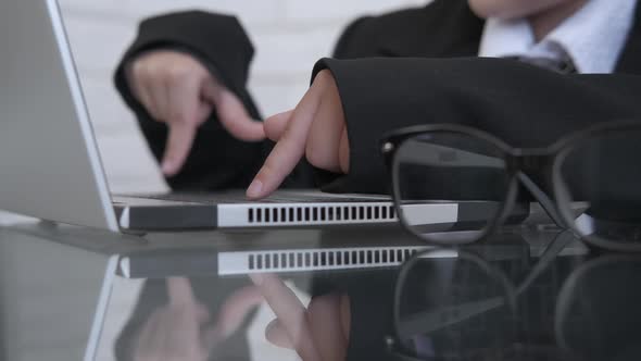 Child hands on keyboard. 