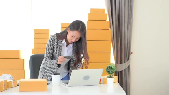 Young asian woman use laptop