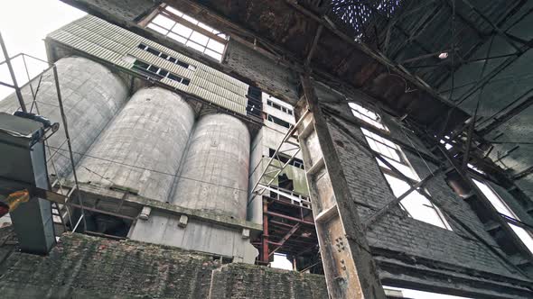 Ruined and abandoned creepy industrial factory. Old industrial building for demolition.