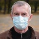 Close Up Portrait of Senior Man Wearing Medical Face Mask - VideoHive Item for Sale