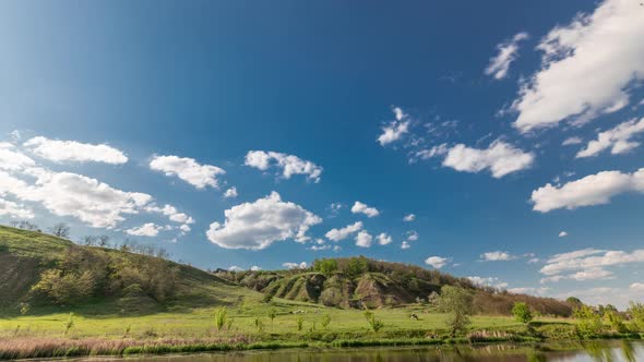 Green Field and Blue Sky with White Cloud Timelapse