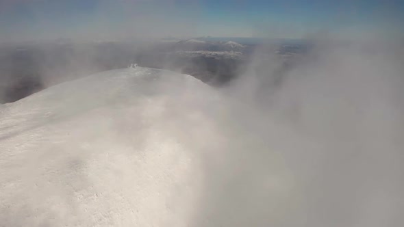 Beautiful Winter Aerial Flight Over Mountain