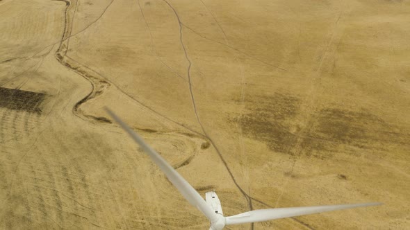 Aerial shot of Windmills spinning on Montezuma Hills